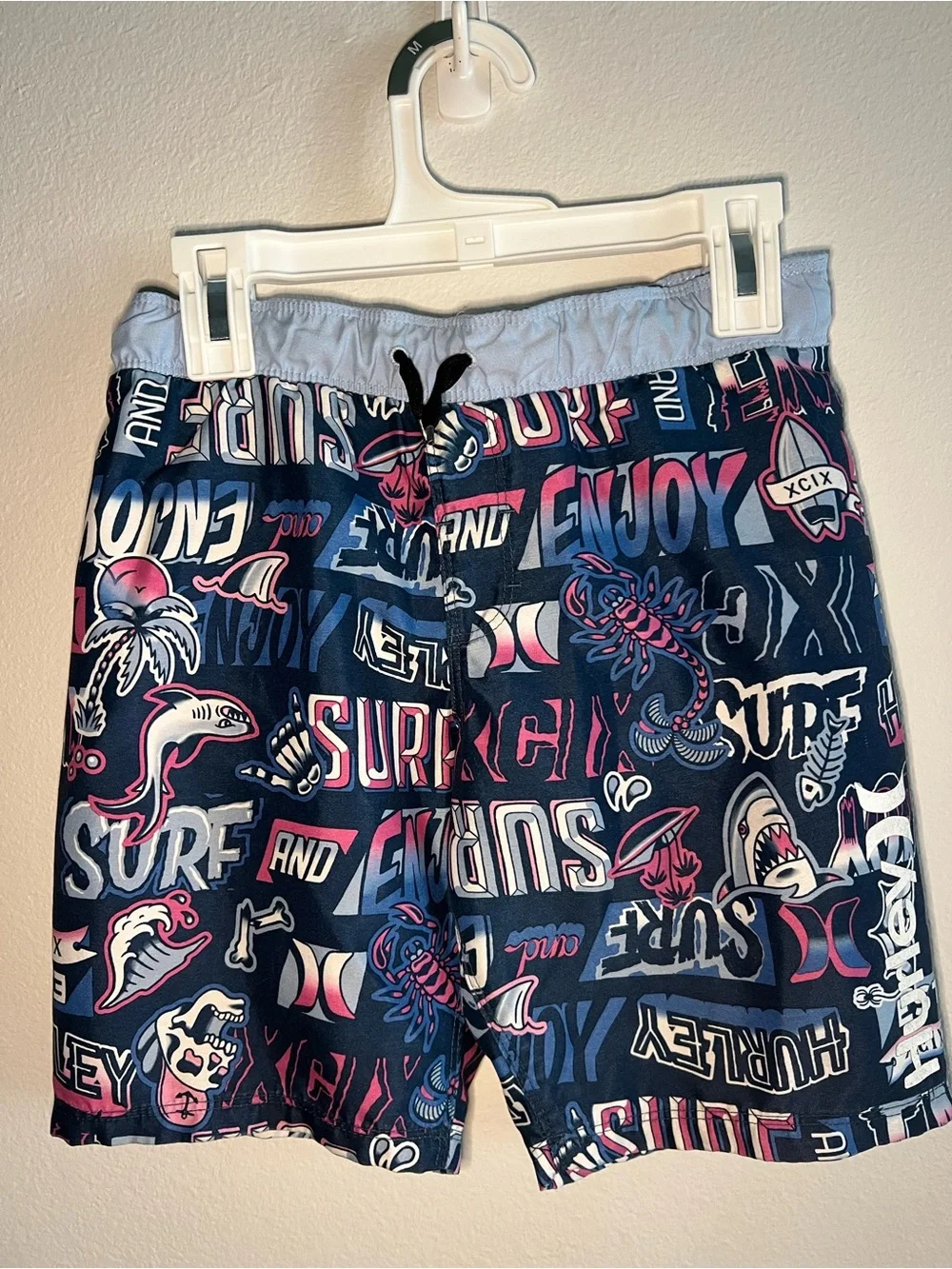 Hurley Navy Swim Shorts with Pink and White Surf Graphics